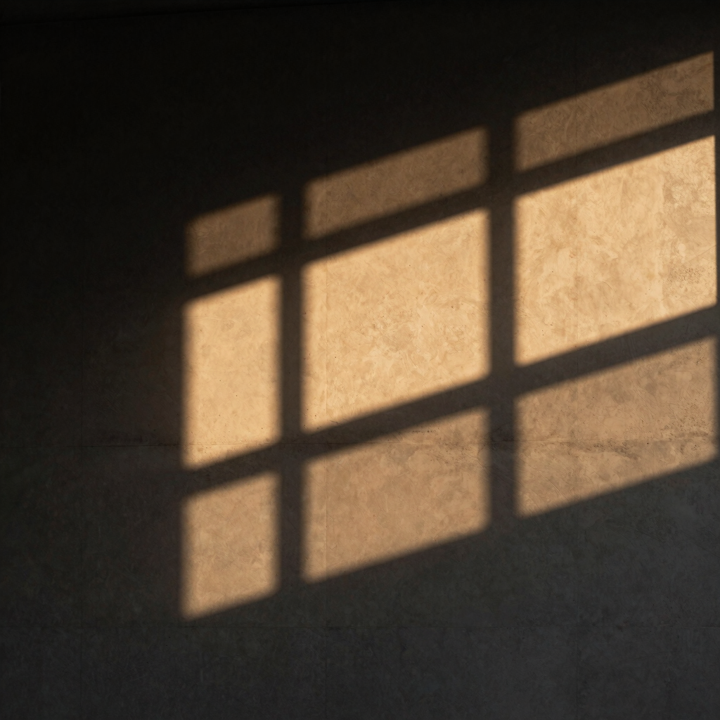 Abstract architectural detail of structured shadows on a concrete wall, warm golden-hour light, minimalist and sophisticated, 35mm.